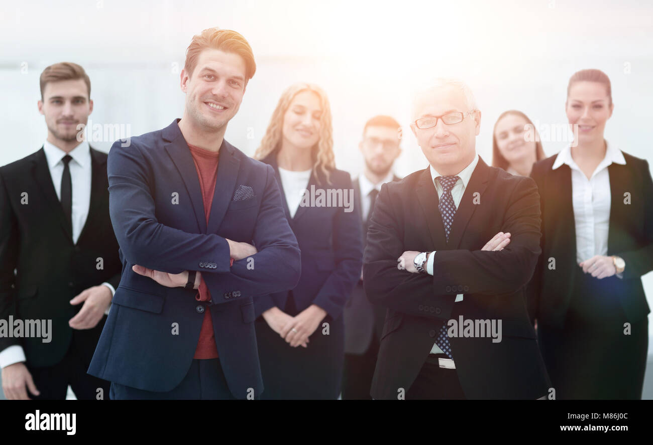 business partners standing in front of the business team Stock Photo ...