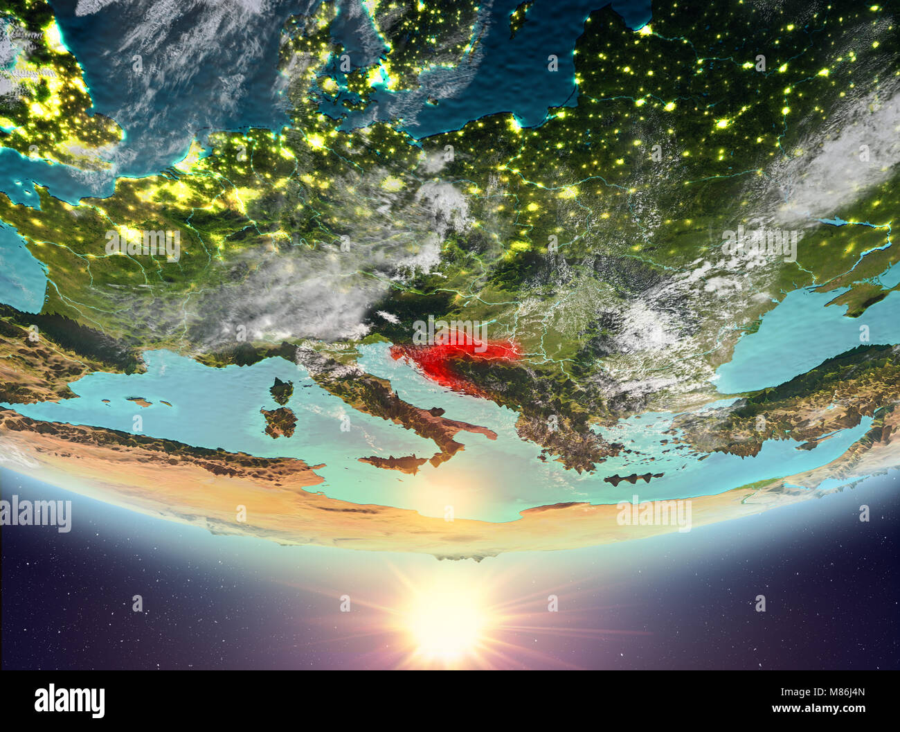 Croatia during sunrise highlighted in red on planet Earth with clouds ...