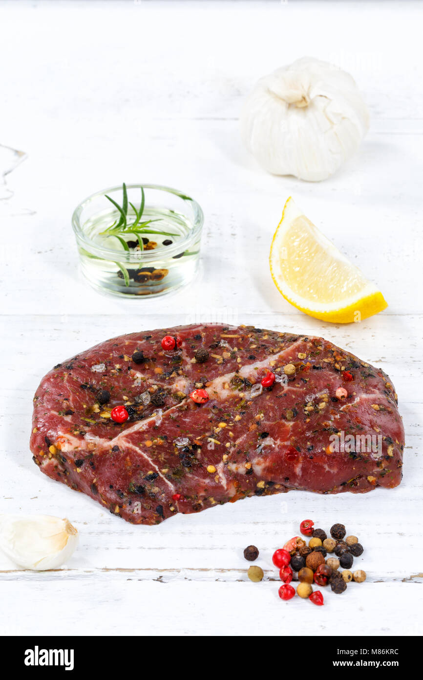 Meat raw beef steak portrait format wooden board wood Stock Photo