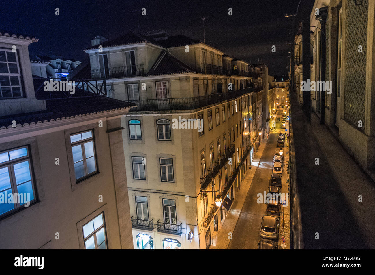 VIEW FROM BALCONY AT OLD CITY OF LISBON AT NIGHT Stock Photo