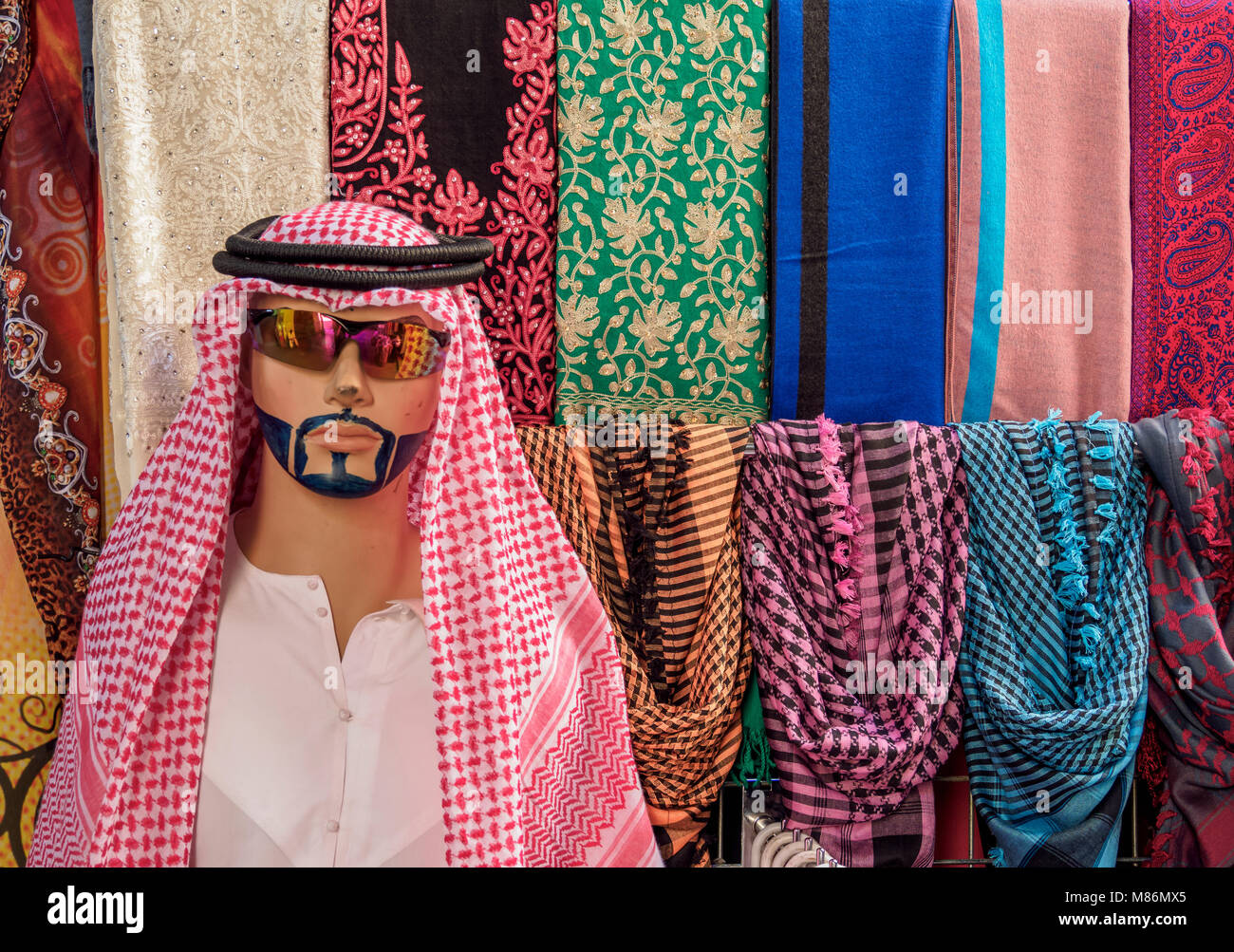 Traditional Clothing sold on the souk, Deira, Dubai, United Arab Emirates Stock Photo
