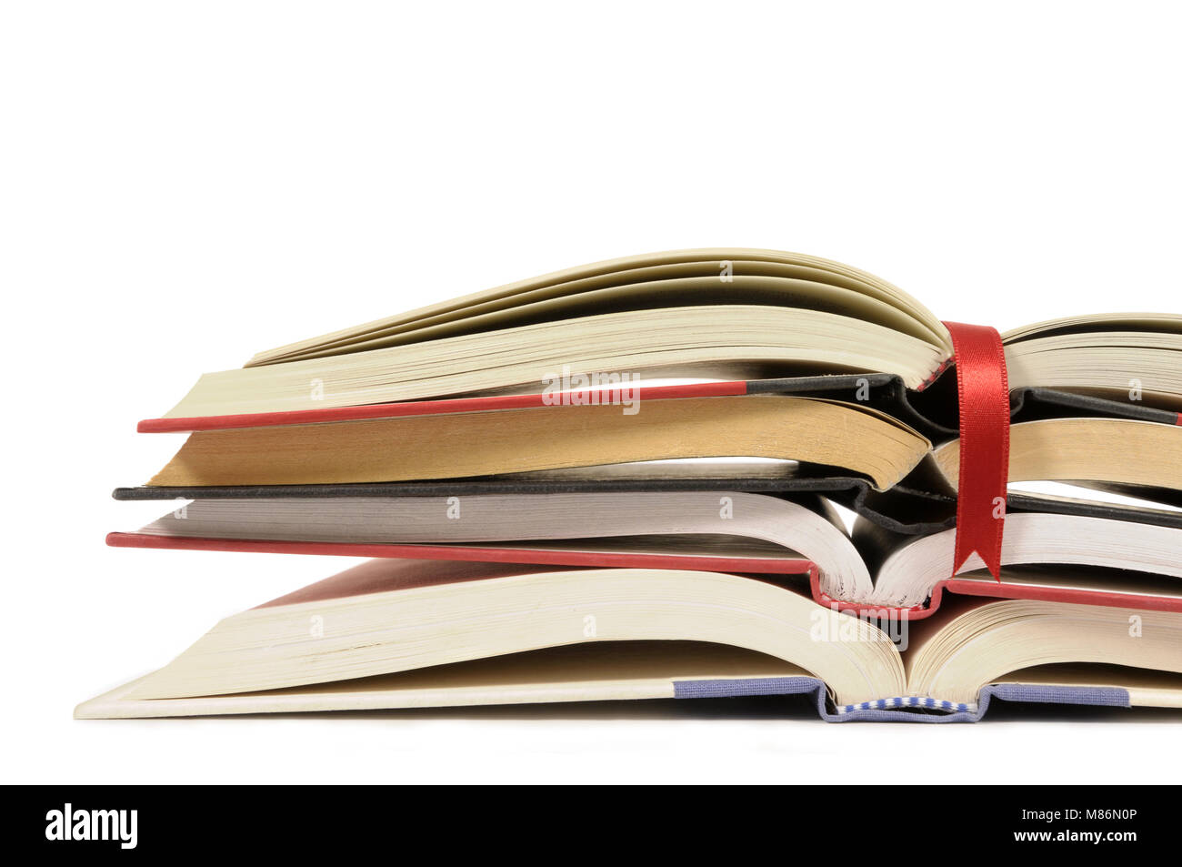 Cluster of open books isolated against a white background Stock Photo -  Alamy