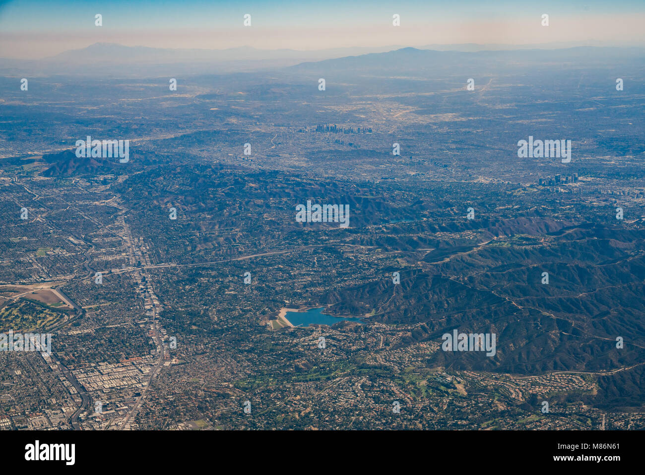 Aerial view of Encino Reservoir, Van Nuys, Sherman Oaks, North Hollywood, Studio City on Airplane, Los Angeles County Stock Photo