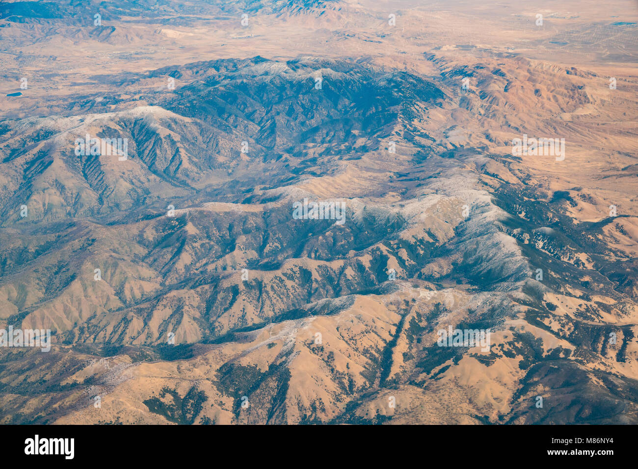 Aerial view of some snow mountain around Kern County form airplane Stock Photo