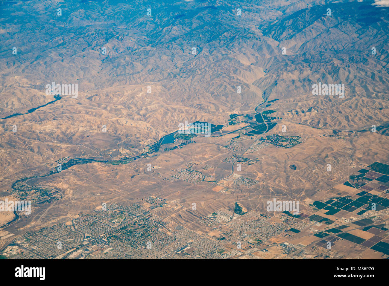 Aerial view of farm, landscape over Kern County from an airplane Stock Photo