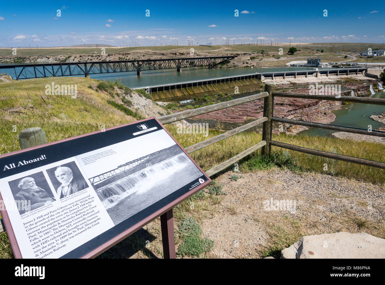 Rainbow Falls and Dam, train trestle behind, Missouri River in Great Falls, Montana, USA, with