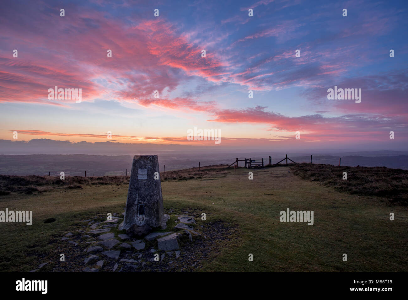 Ordinance Survey Trig point on the summit of Moel Famau, North Wales Stock Photo