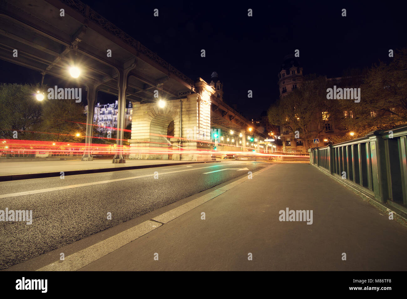 Traffic in city at night, Paris, France Stock Photo