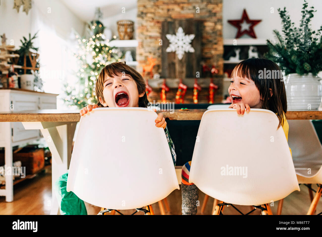 Boy shouting dining table hi-res stock photography and images - Alamy
