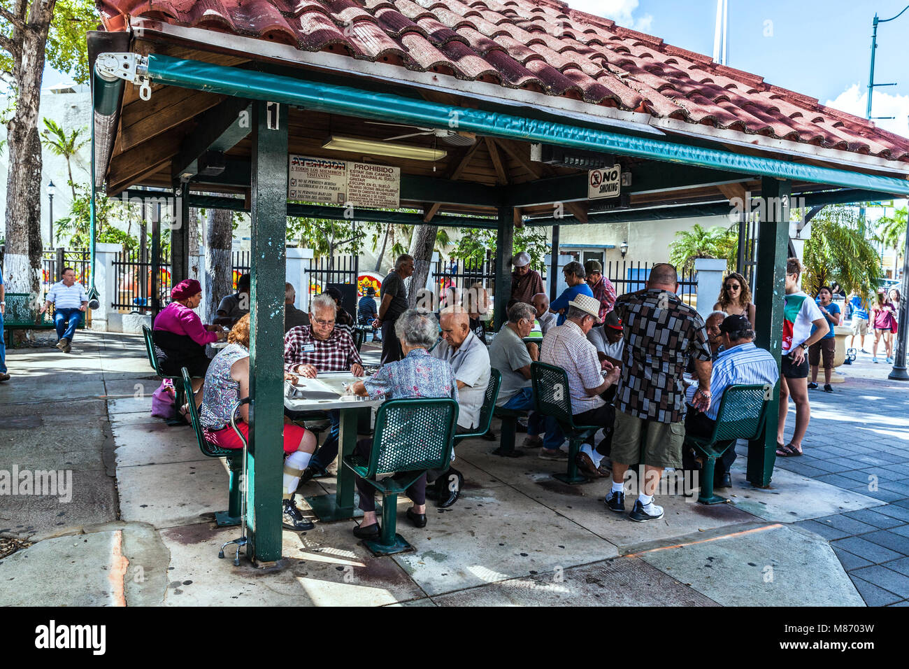 Elderly Cuban American people at the Domino Park, Calle Ocho, Miami, Florida, USA. Stock Photo