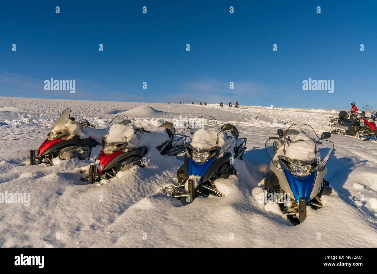 Snowmobiles on Hagafellsjokull Glacier, Langjokull Ice Cap, Iceland.  Hagafellsjokull Glacier, Langjokull Ice Cap, Iceland. Stock Photo