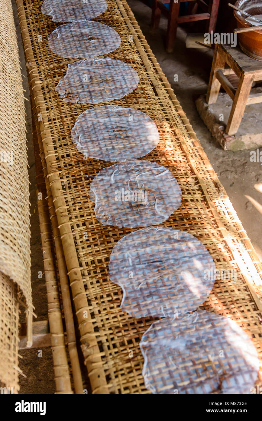 Rice paper made from rice paste, is left it onto bamboo drying racks