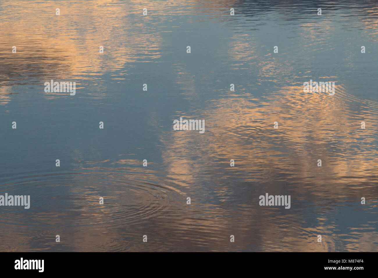 a reflection of the clouds in the water Stock Photo - Alamy