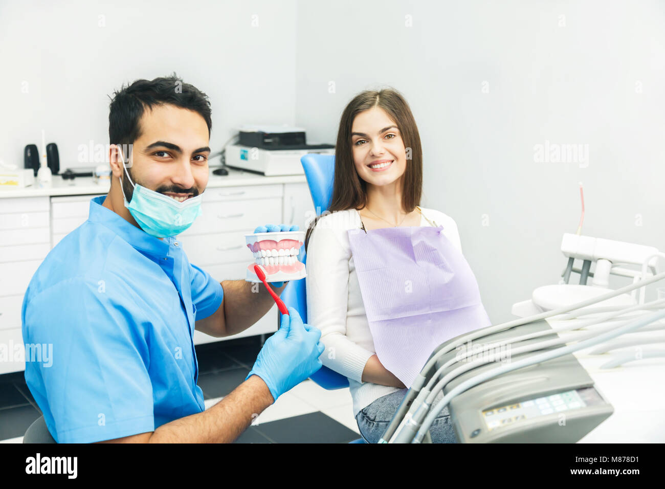 Dentist Shows How to Clean Teeth Stock Photo Alamy
