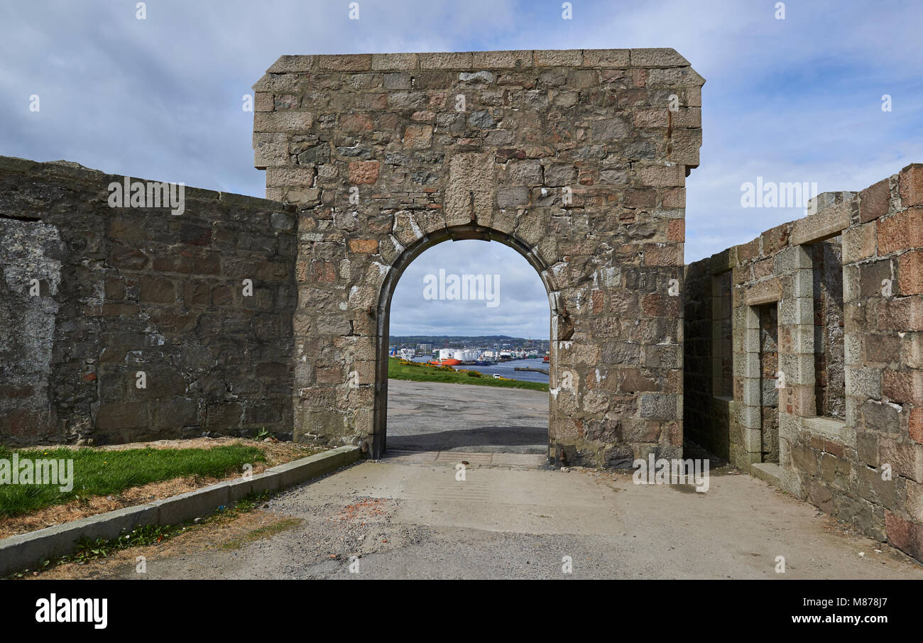 Looking through the entrance Archway of the Torre Battery, towards Aberdeen Harbour and City, in Scotland. Stock Photo
