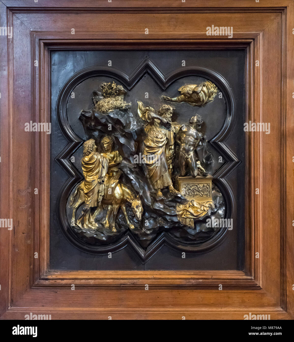 Florence. Italy. The Sacrifice of Isaac, 1401/02, by Lorenzo Ghiberti, relief in gilded bronze, Museo Nazionale del Bargello. Bargello National Museum Stock Photo