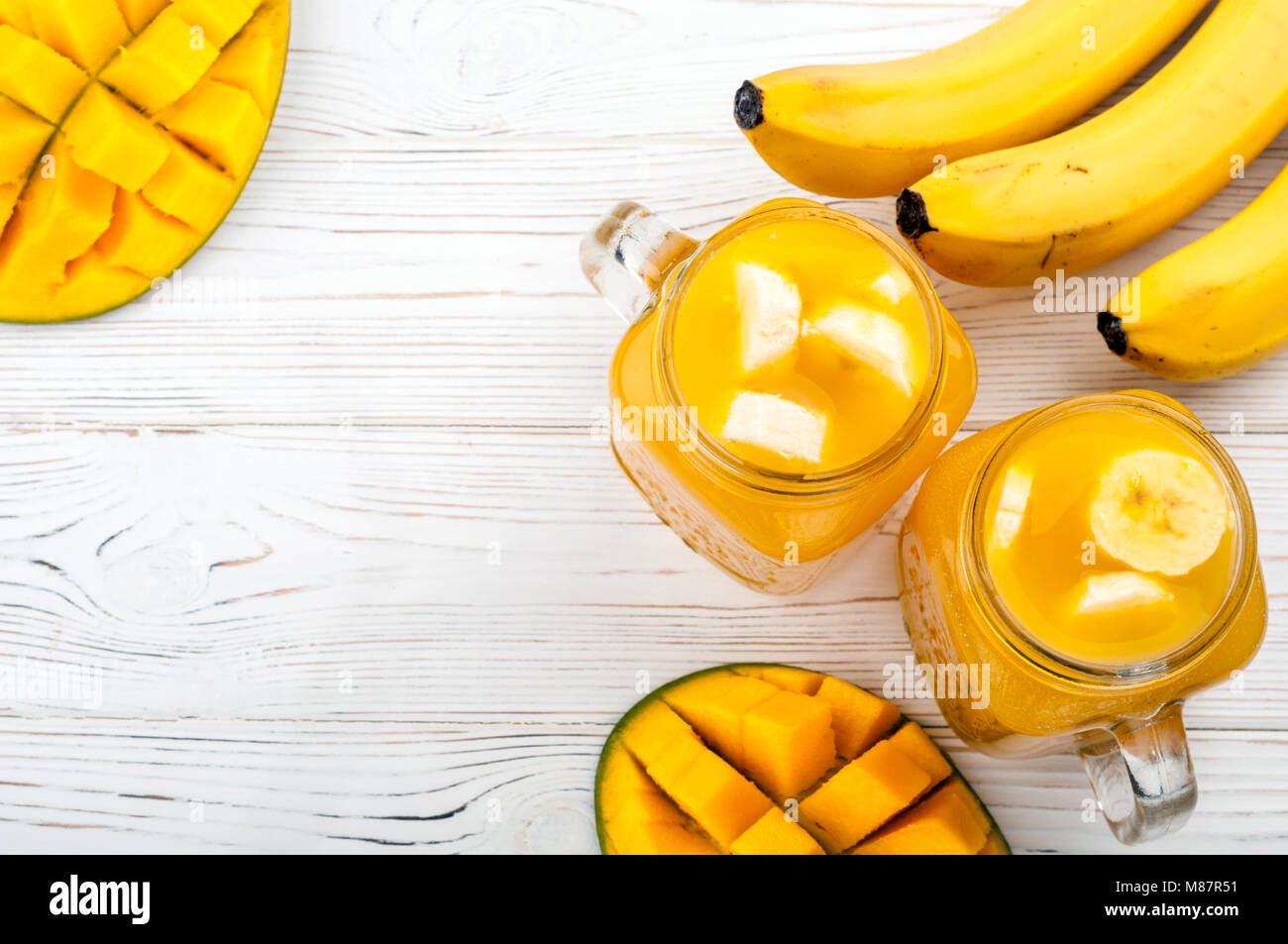 Mango juice. Summer drink with fruits mango and banana cocktail on