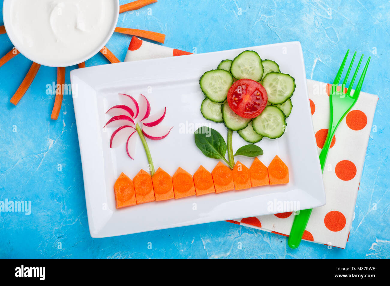 Kids food. Funny vegetable salad for kids. Healthy food with vegetables
