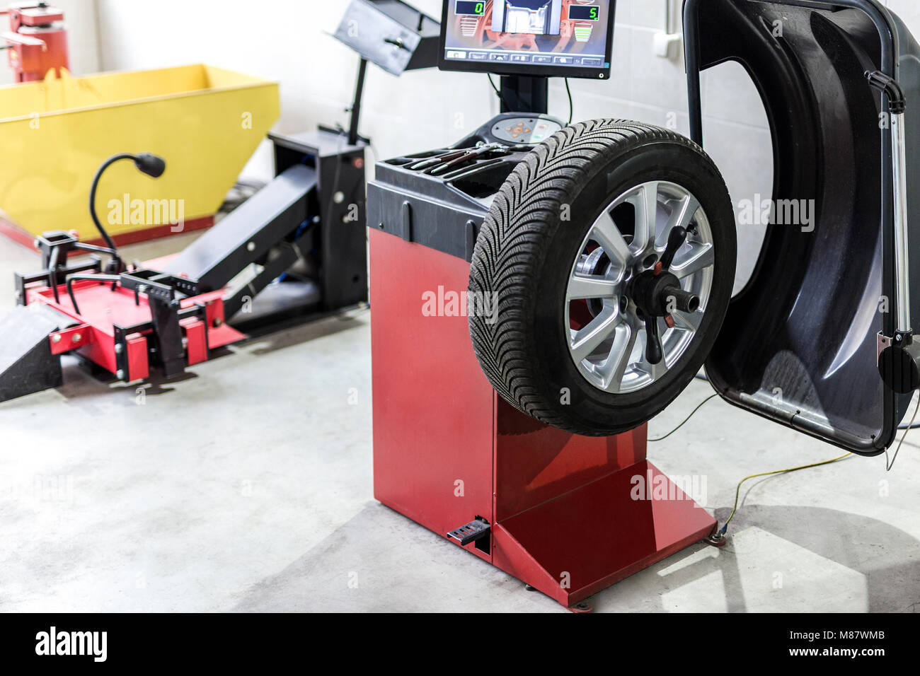 Car maintenance and service center. Vehicle tire repair and replacement