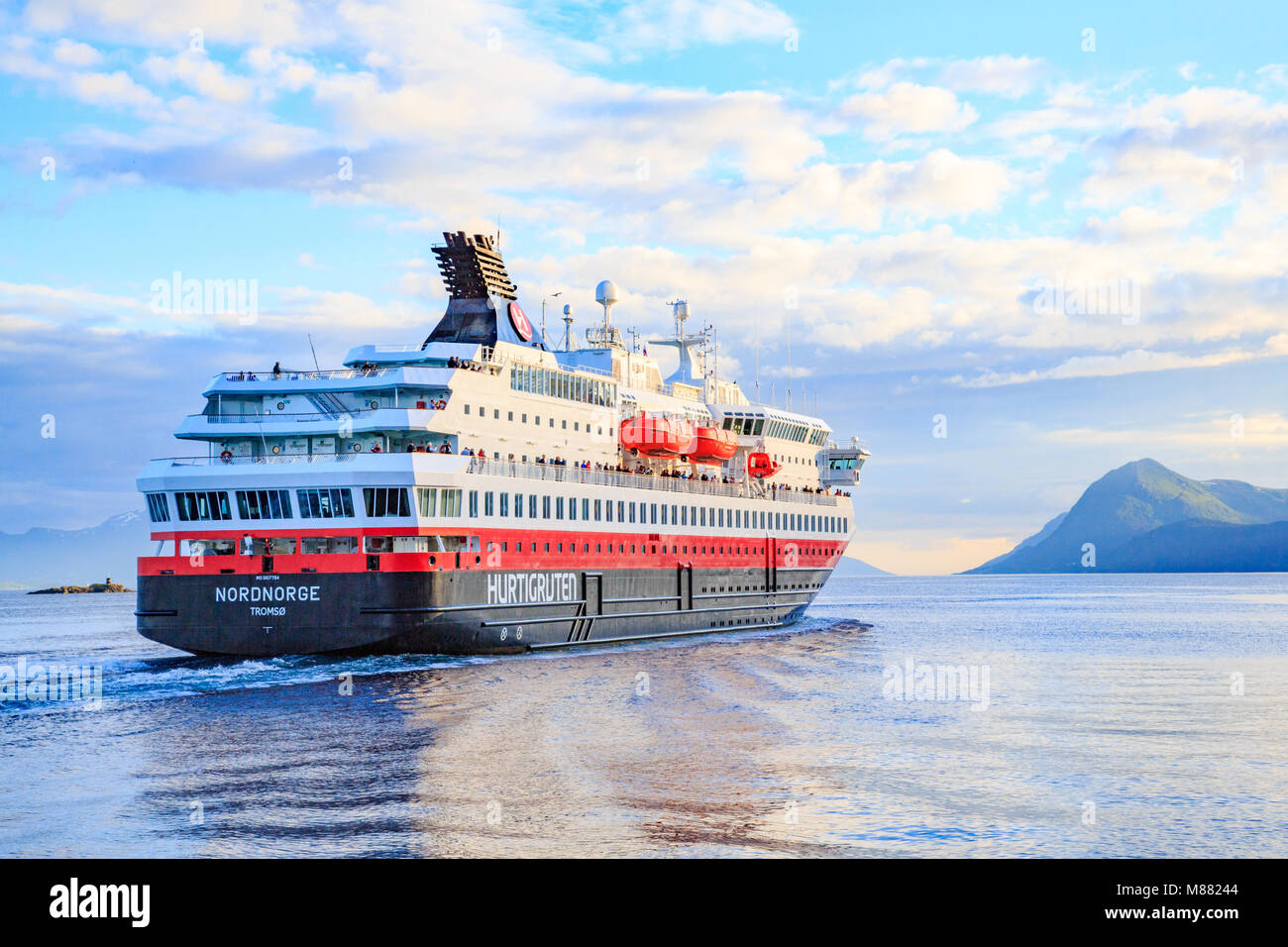 Close up of Hurtigruten cruise ferry sailing on the fjord of Molde, Norway Stock Photo