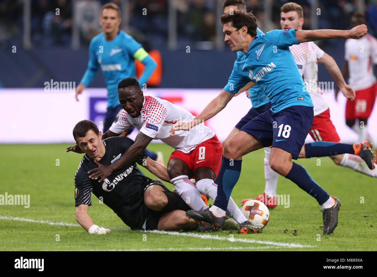 Saint Petersburg, Russia. 15th Mar, 2018. Andrei Lunev (L), Yuri Zhirkov of FC Zenit Saint Petersburg and Naby KeÃ¯ta (C) of RB Leipzig vie for the ball during the UEFA Europa League Round of 16 2nd leg football match between FC Zenit Saint Petersburg and RB Leipzig at Saint Petersburg Stadium. Credit: Igor Russak/SOPA Images/ZUMA Wire/Alamy Live News Stock Photo