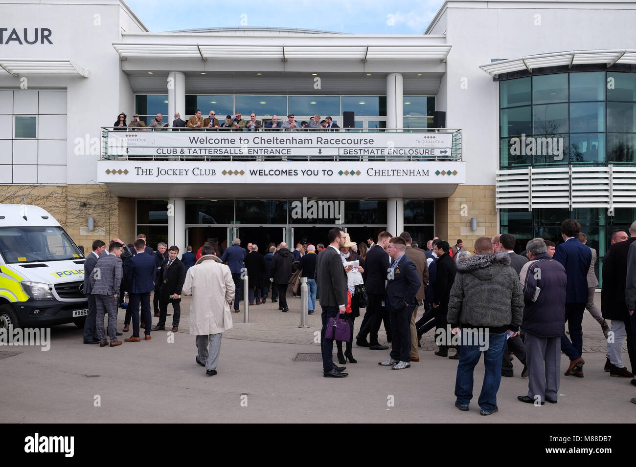 Cheltenham Festival, Gloucestershire, UK - Friday 16th March 2018 - Race goers arrive at the Cheltenham racing festival ahead of this afternoons classic Gold Cup race.  Steven May / Alamy Live News Stock Photo