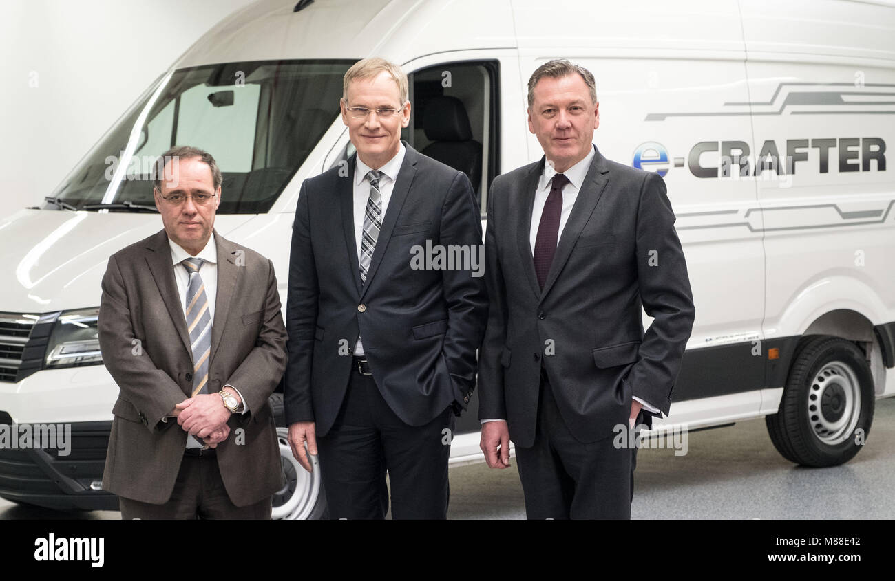 Hanover, Germany. 16 March 2018, Financial Executive Winfried Krause (l-r), chairman Eckhard Scholz and Marketing and Sales Executive Heinz-Juergen Loew of Volkswagen Commercial Vehicles smile at their company's performance review for 2017. VW Commercial Vehicles brought in 853 million euros in 2017, which is 87.6% more than in 2016. Photo: Peter Steffen/dpa Credit: dpa picture alliance/Alamy Live News Stock Photo