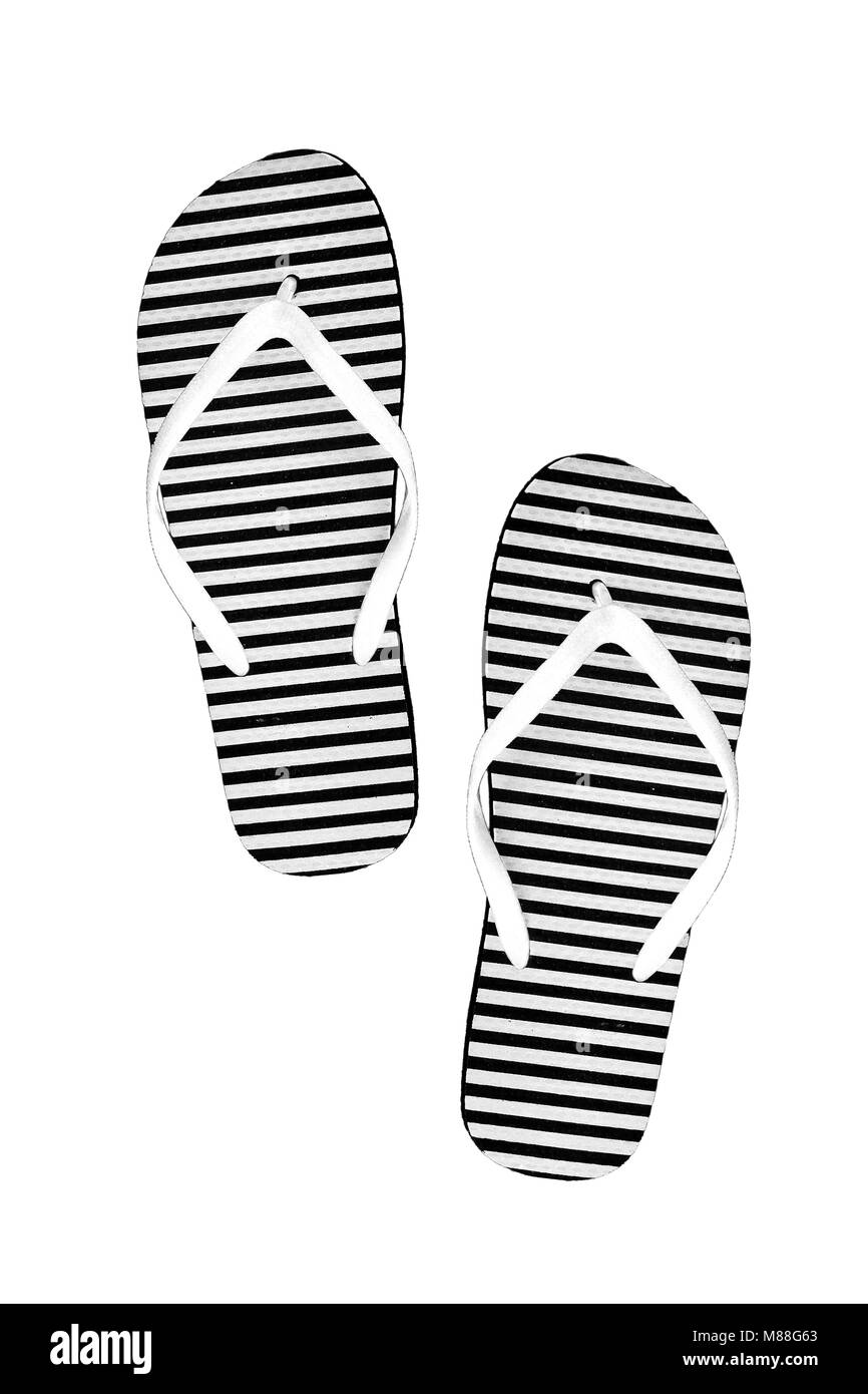 Striped rubber flip flops, isolated on a white background. Stock Photo