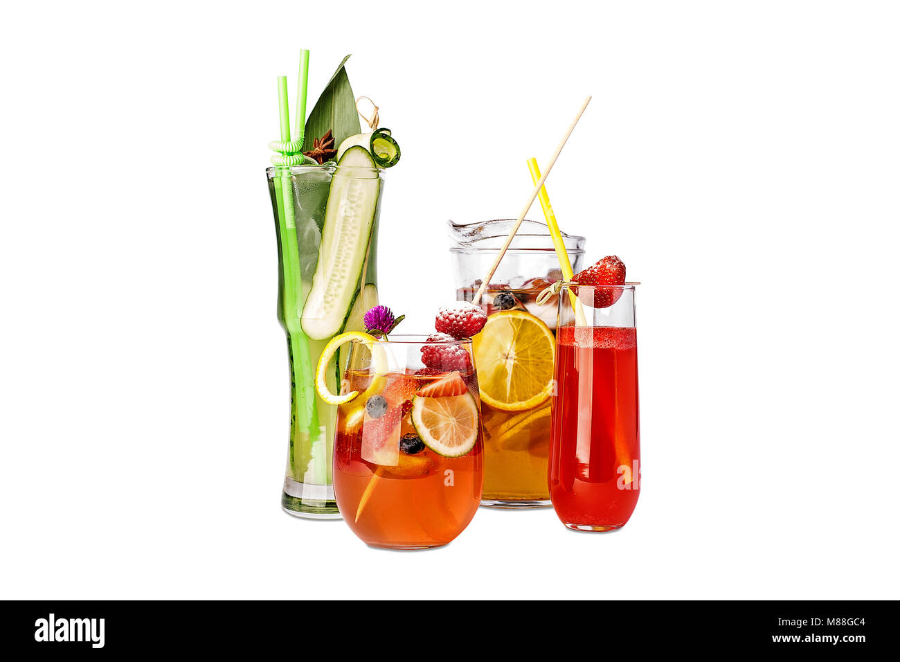 Assorted beverages with fruits and vegetables. in a pitchers and glasses. Stock Photo