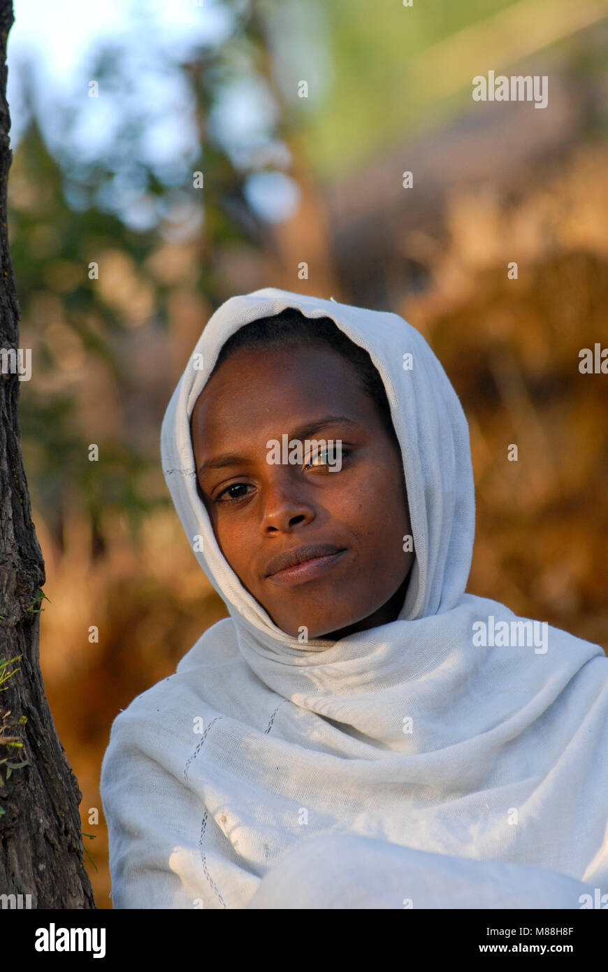 ETHIOPIA Lalibela, girl with white scarf/ AETHIOPIEN Lalibela, Maedchen mit weissem Schal Stock Photo
