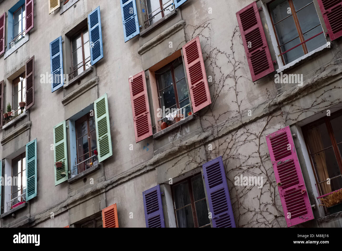 Colourful wooden window shutters in Geneva, Switzerland Stock Photo