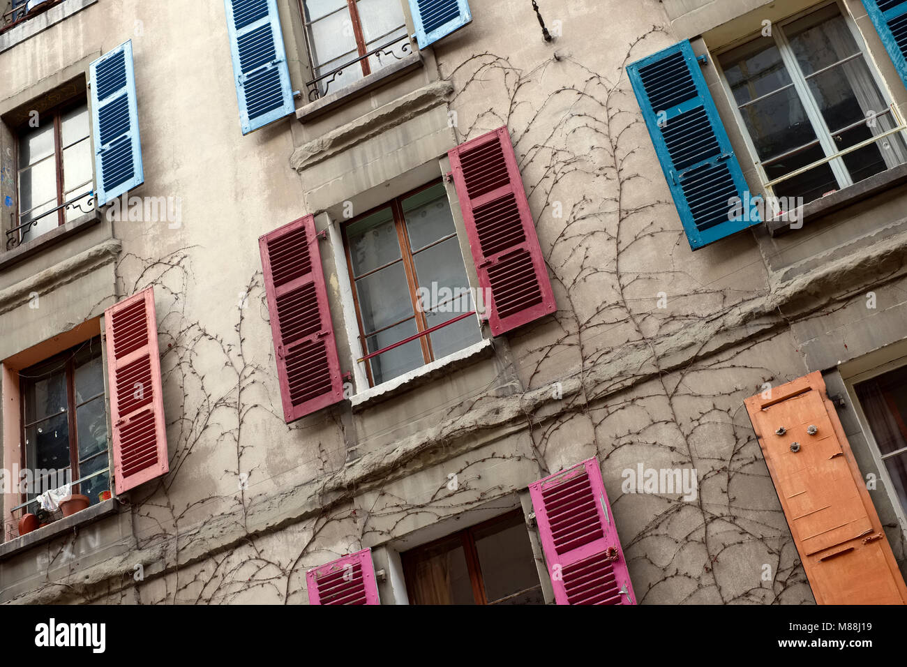 Colourful wooden window shutters in Geneva, Switzerland Stock Photo