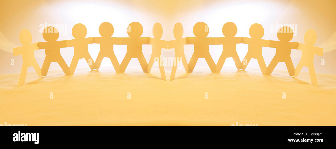 Team of paper chain people in a row holding hands Stock Photo - Alamy
