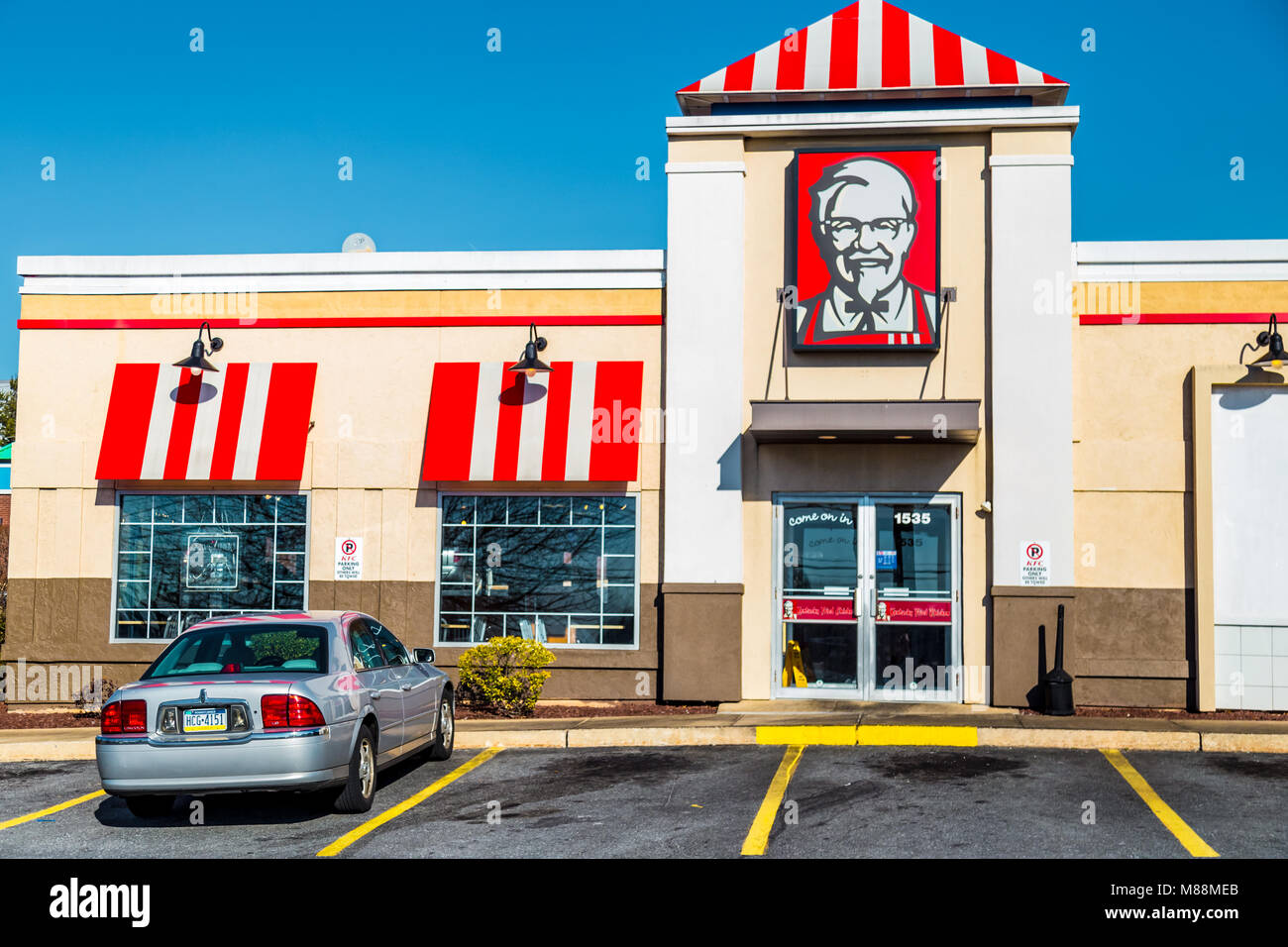 Lancaster, PA, USA - February 19, 2017: A KFC Restaurant, previously known as Kentucky Fried Chicken, is an American fast food chain with over 20,000  Stock Photo