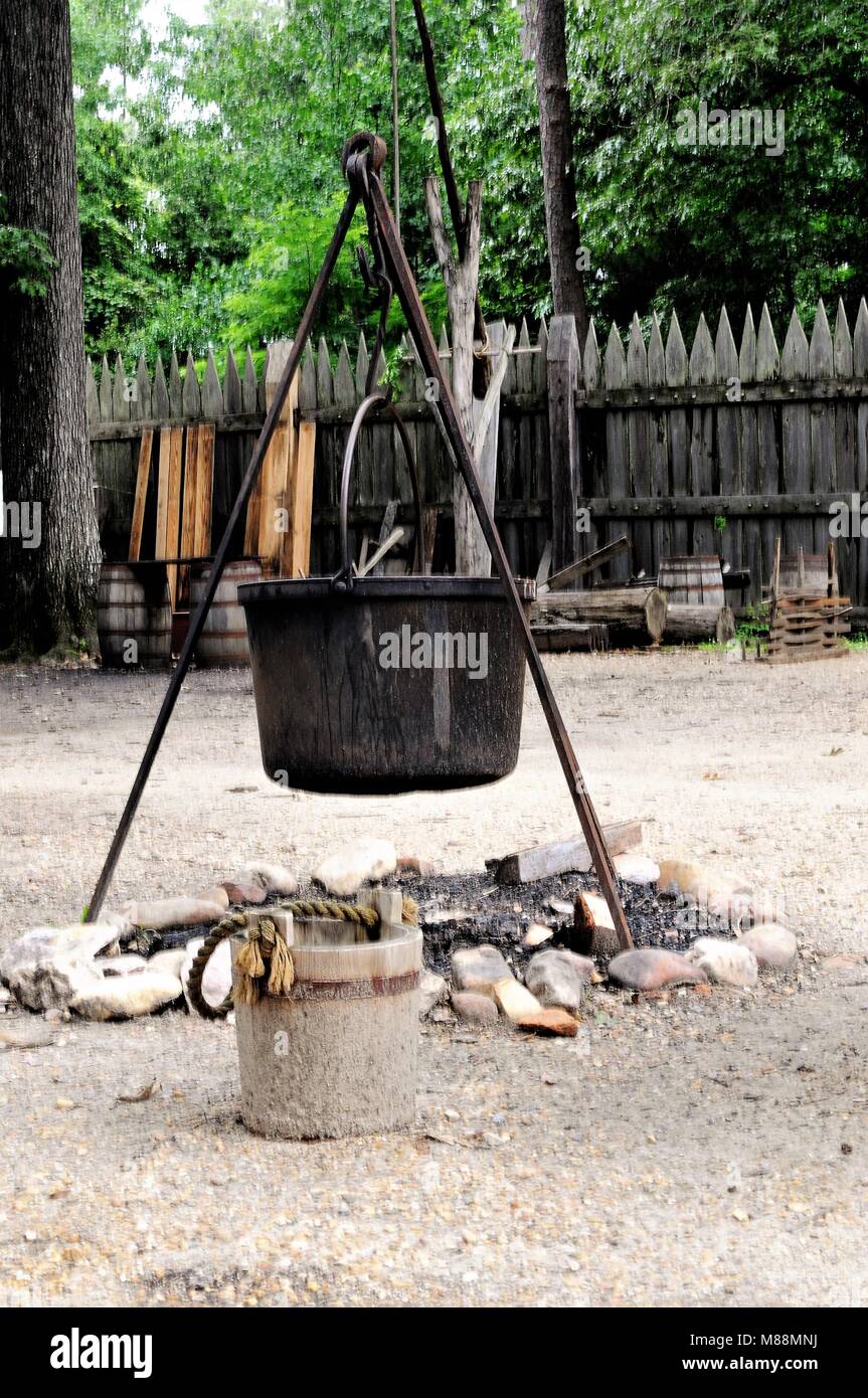 Cast iron pot setup over an open fire. Jamestown settlement, Virginia Stock Photo