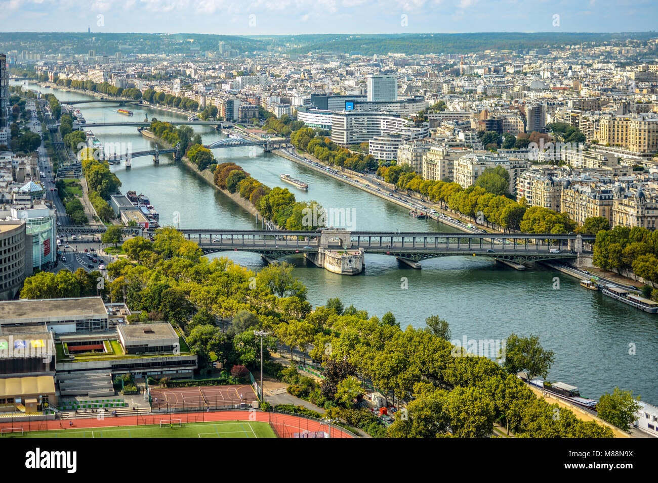 Île aux Cygnes a small island on the river Seine in Paris, France, in the 15th arrondissement and Pont de Grenelle Bridge taken from the Eiffel Tower Stock Photo
