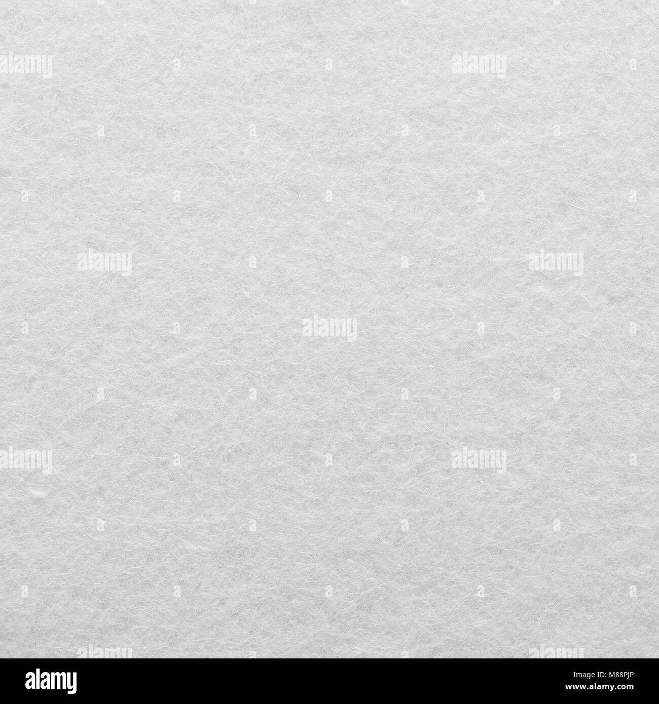 White felt fabric texture to be used as a neutral background Stock