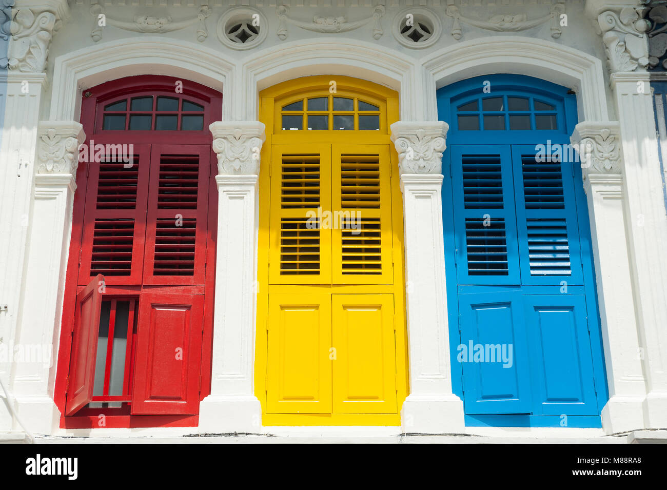 31.01.2018, Singapore, Republic of Singapore, Asia - Colourful window shutters on a building in Singapore's Little India district. Stock Photo