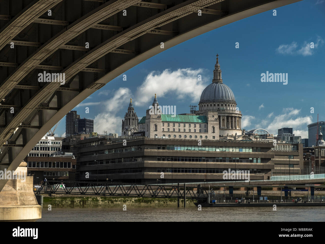 St Pauls Cathedral and the Thames as seen from under the arches of Blackfriars Station. Stock Photo