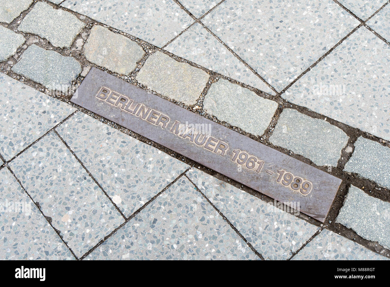commemorative plaque marking former border Berlin Wall Stock Photo