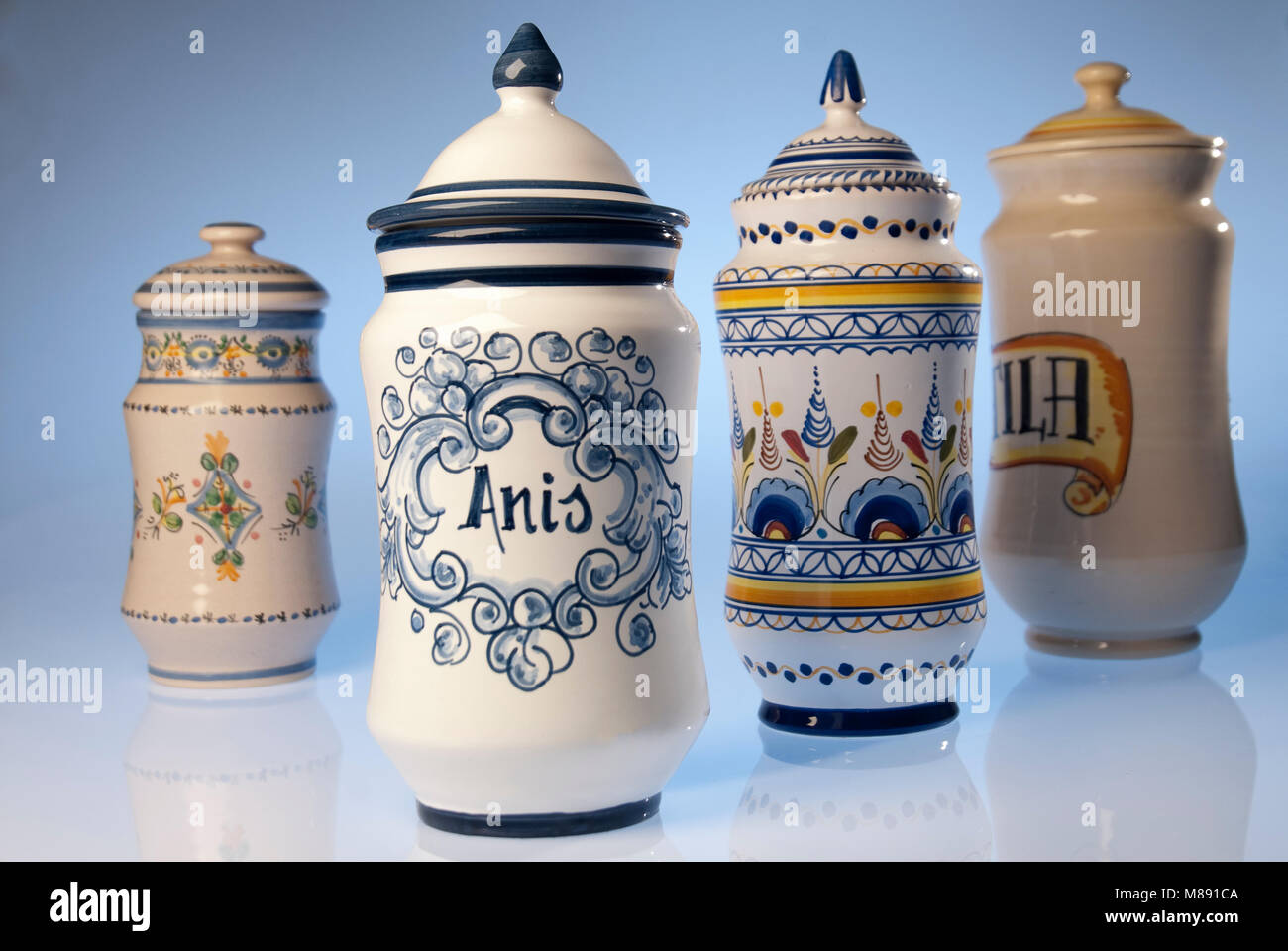 Antique pharmacy jars of artisanal ceramics, medicinal herbs, natural