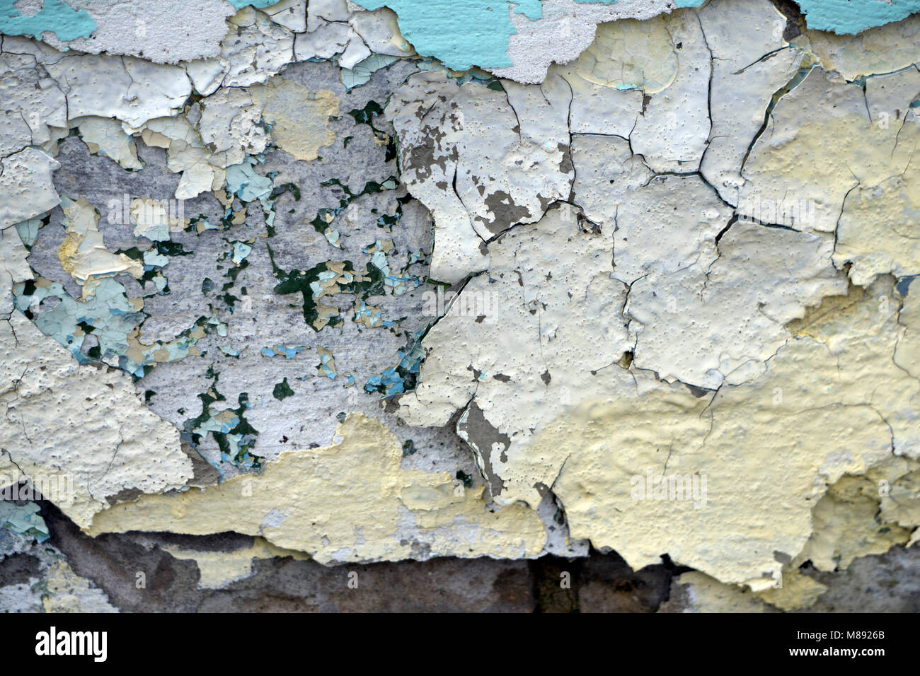 Close up paint layers, many paint and paper layers give an Abstract