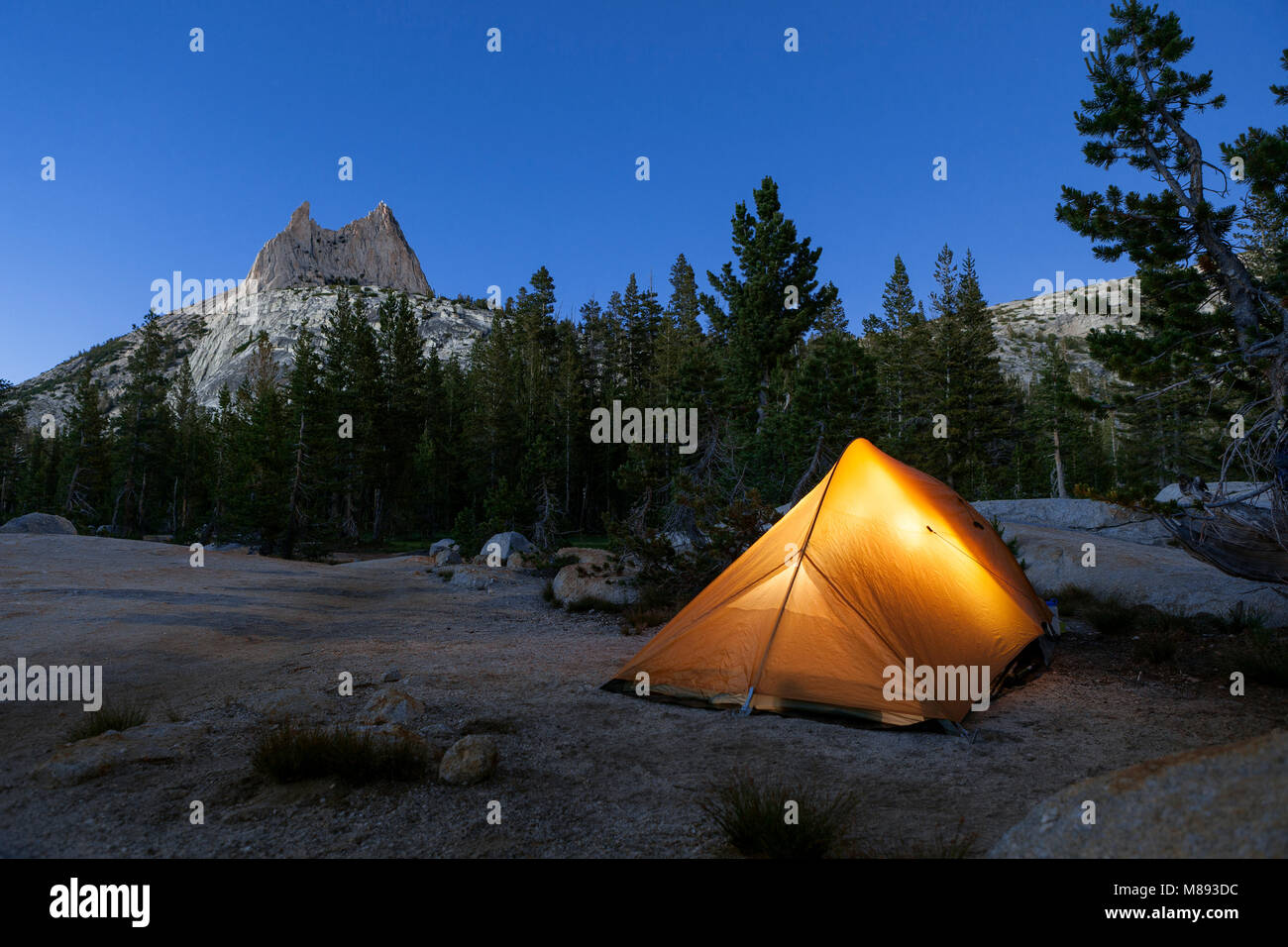 CA02867-00...CALIFORNIA - Campsite in Yosemite National Park at Cathedral Lakes with Cathedral Peak in the background. Stock Photo