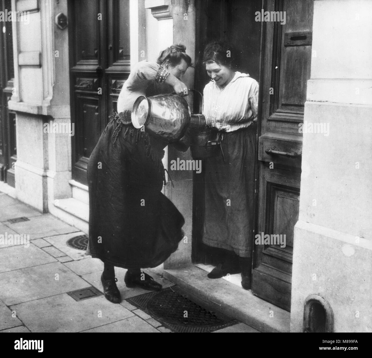 Home Milk Delivery, Brussels, Belgium, by Burton Holmes, 1919 Stock Photo