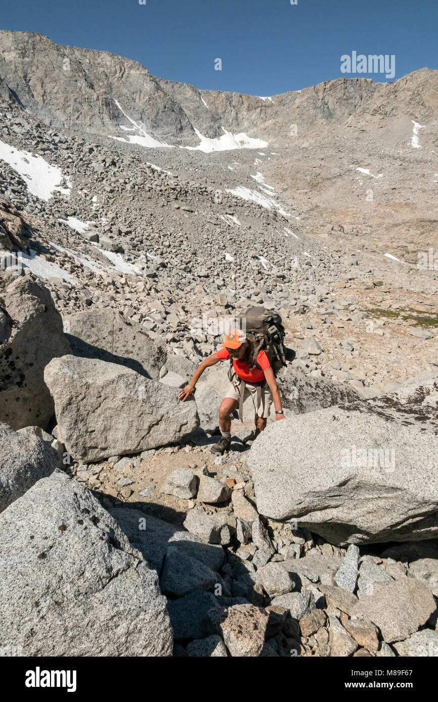 CA03378-00..CALIFORNIA - Vicky Spring climbing the pass between the Piute Trail  and the Darwin Lakes on the High Sierra Route. Stock Photo