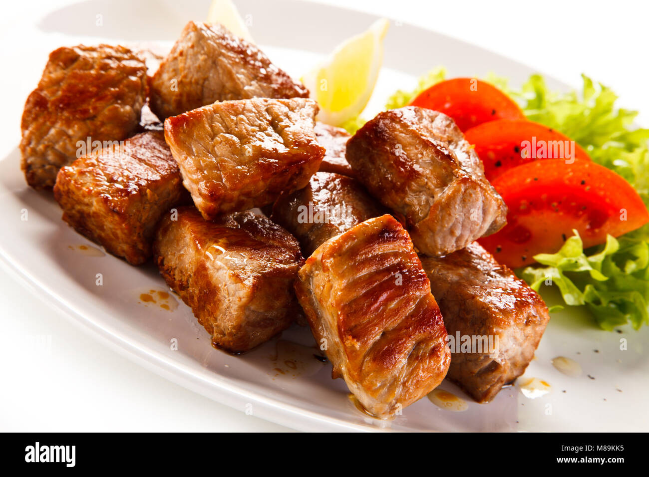 Kebabs - grilled meat and vegetables Stock Photo