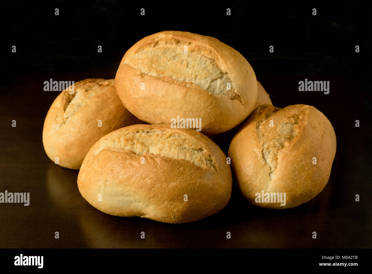 Small bread rolls, brštchen - breakfast rolls - traditional german rolls -  on dark background Stock Photo - Alamy