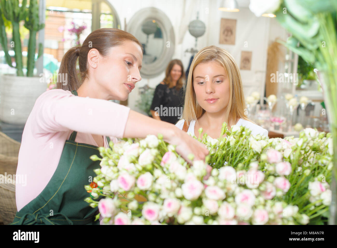 Florist with a customer Stock Photo Alamy