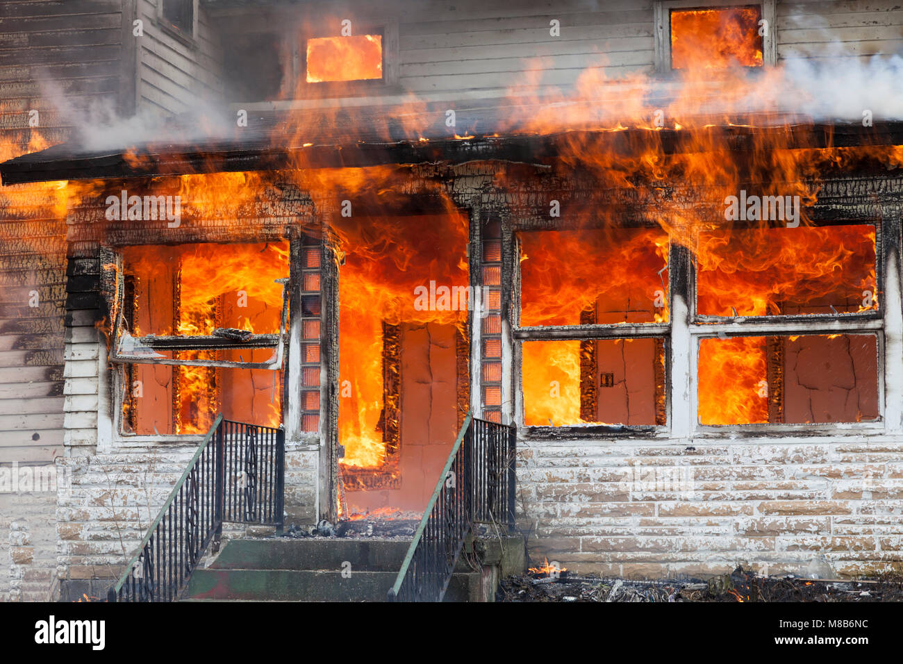 Old farm house burning, E USA, by James D Coppinger/Dembinsky Photo Assoc Stock Photo
