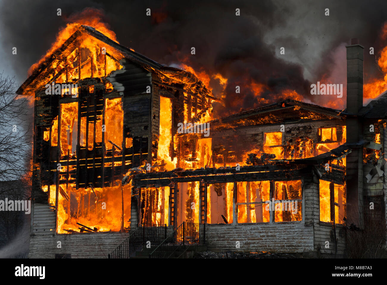 Old farm house burning, E USA, by James D Coppinger/Dembinsky Photo Assoc Stock Photo